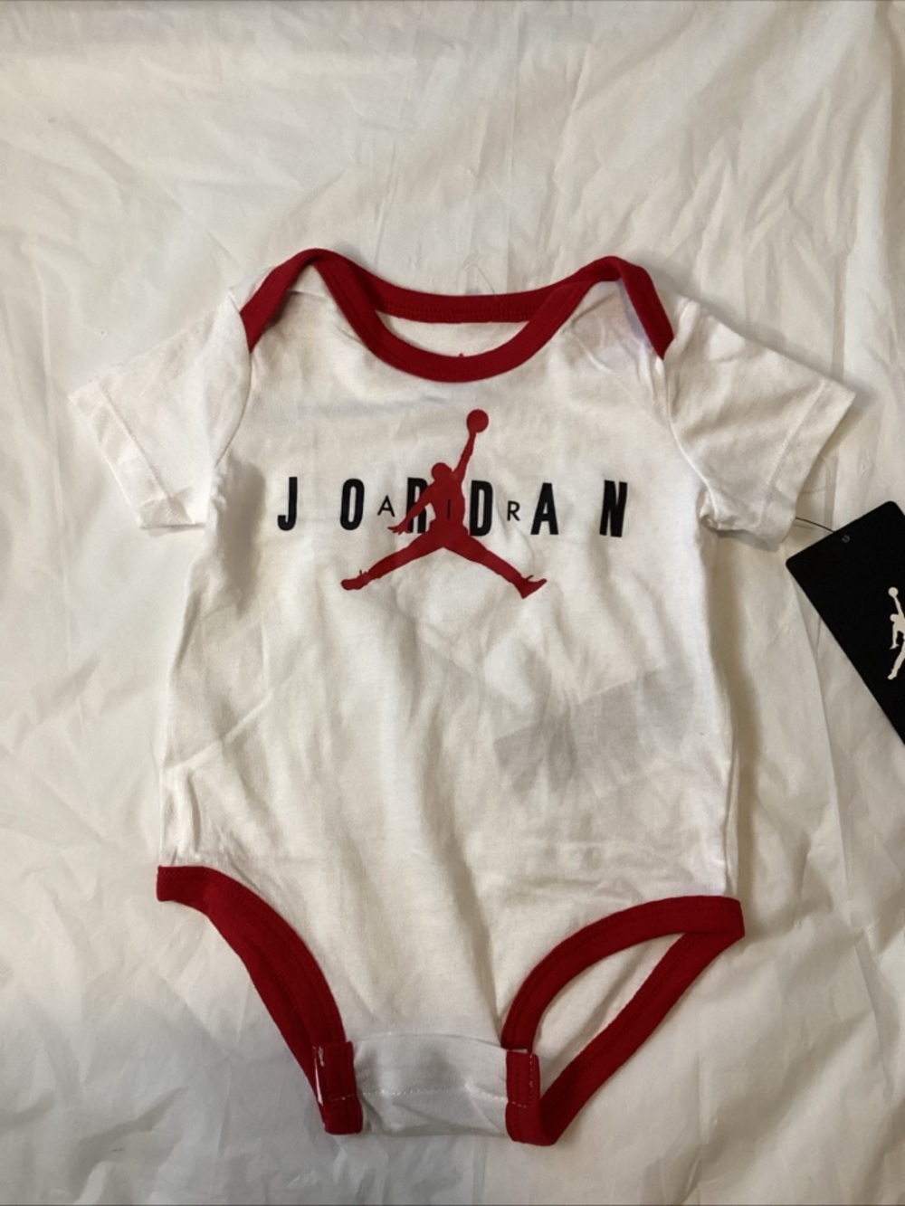 Jordan White Baby Bodysuit with Red Trim and Red Jumpman